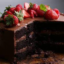 image description: a chocolate cake with strawberries on top